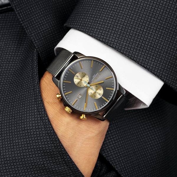 TXM095 Gun Metal Grey watch with gold accents, a must have.